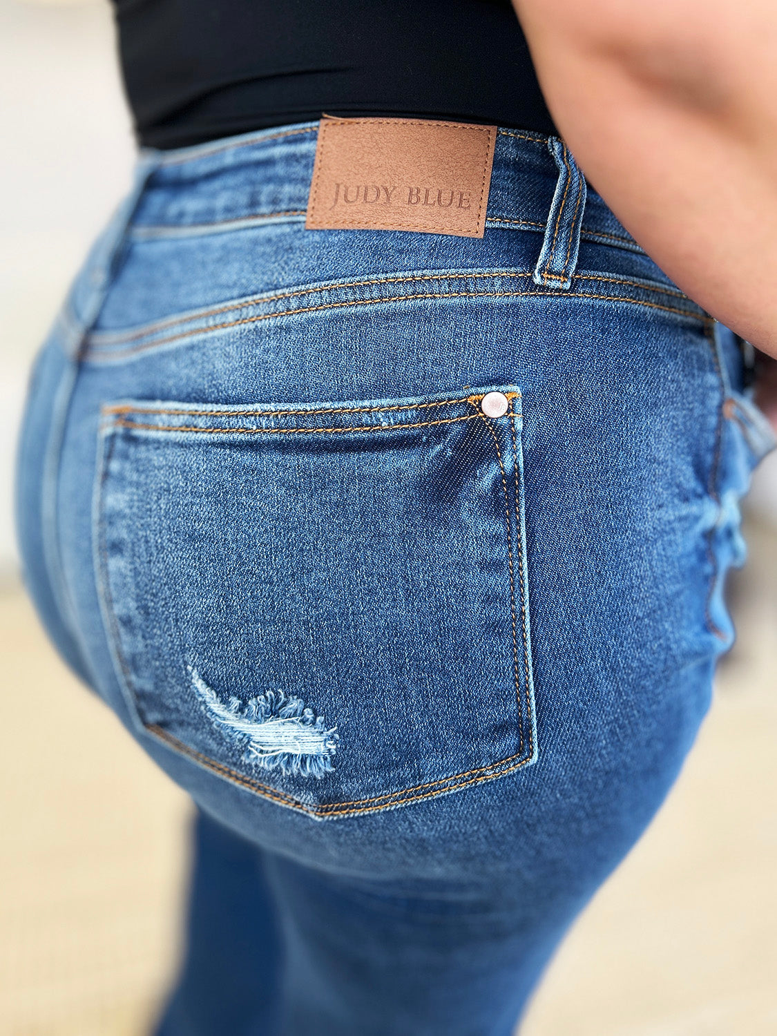 Judy Blue Full Size Mid Rise Distressed Raw Hem Women’s Jeans - In Style Chics Boutique LLC