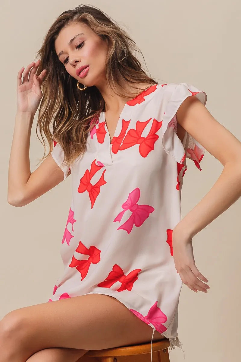 Bow Printed Woven Ruffled Sleeves V Neck Top at In Style Chics Boutique