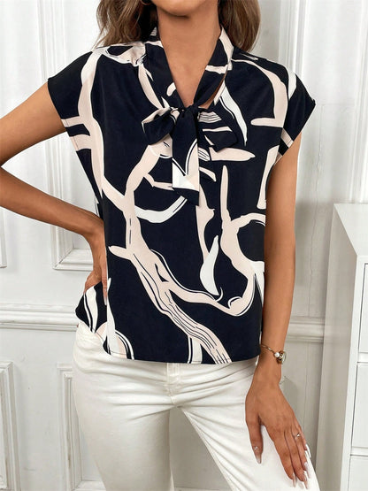 Printed Tie Neck Cap Sleeve Blouse - In Style Chics Boutique LLC