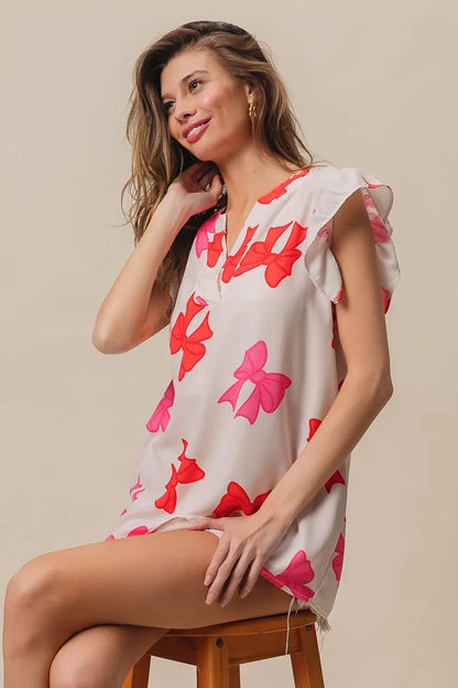 Bow Printed Woven Ruffled Sleeves V Neck Top at In Style Chics Boutique 