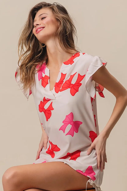 Bow Printed Woven Ruffled Sleeves V Neck Top at In Style Chics Boutique 