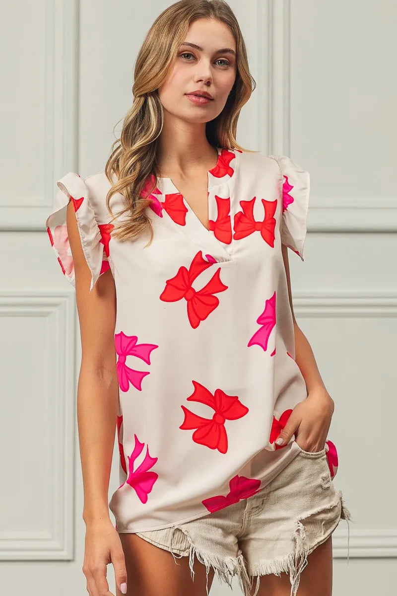 Bow Printed Woven Ruffled Sleeves V Neck Top at In Style Chics Boutique 