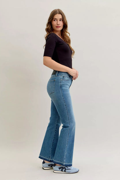 Judy Blue Mid Rise Slim Bootcut Tummy Control Release Hem Jeans 💙 at In Style Chics Boutique 