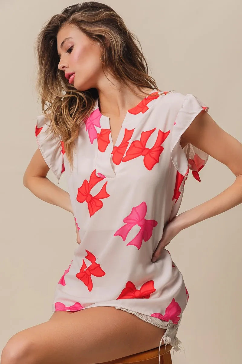 Bow Printed Woven Ruffled Sleeves V Neck Top at In Style Chics Boutique 