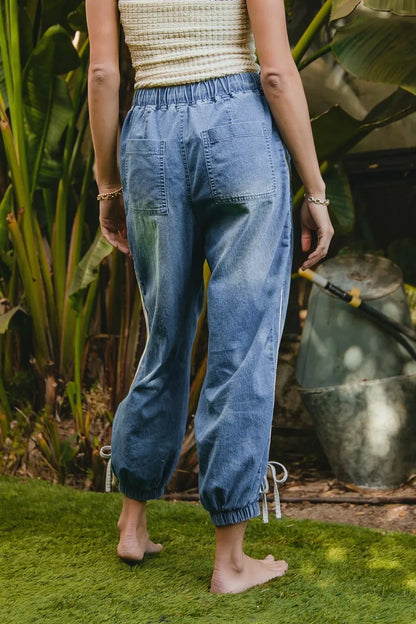 Striped Tape Details With Bot Tied Point Elastic Waist Jeans at In Style Chics Boutique 