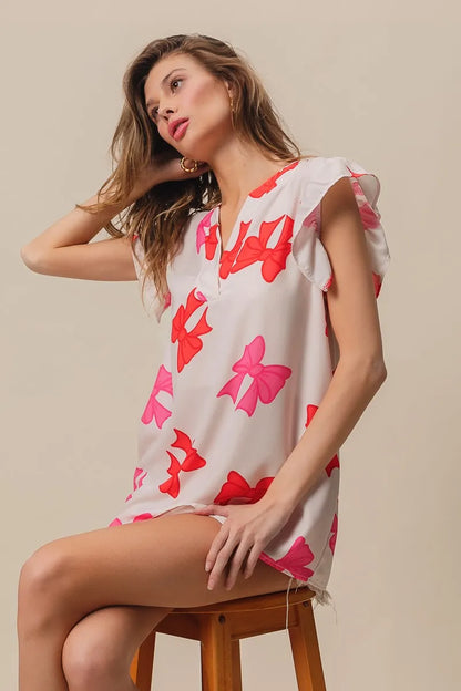 Bow Printed Woven Ruffled Sleeves V Neck Top at In Style Chics Boutique 
