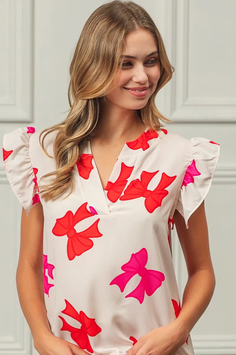 Bow Printed Woven Ruffled Sleeves V Neck Top at In Style Chics Boutique 