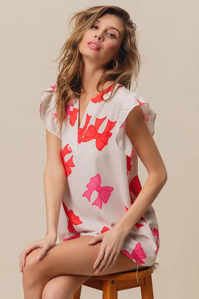 Bow Printed Woven Ruffled Sleeves V Neck Top at In Style Chics Boutique 