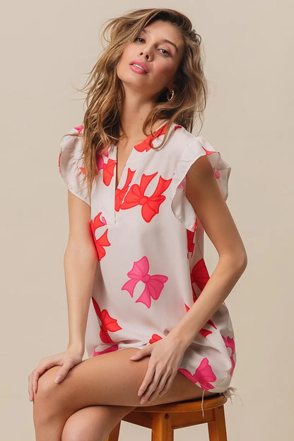 Bow Printed Woven Ruffled Sleeves V Neck Top at In Style Chics Boutique 